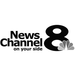 WFLA Tampa logo  where Nuvia Dental Implants Center was featured
