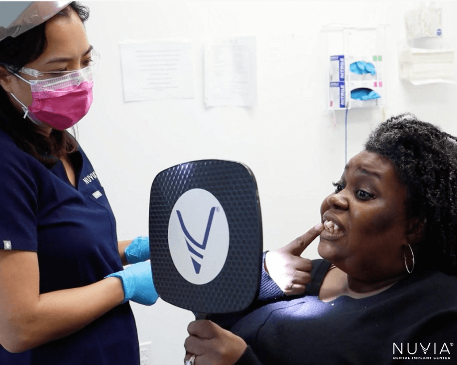 Shalara with her dental implant provider