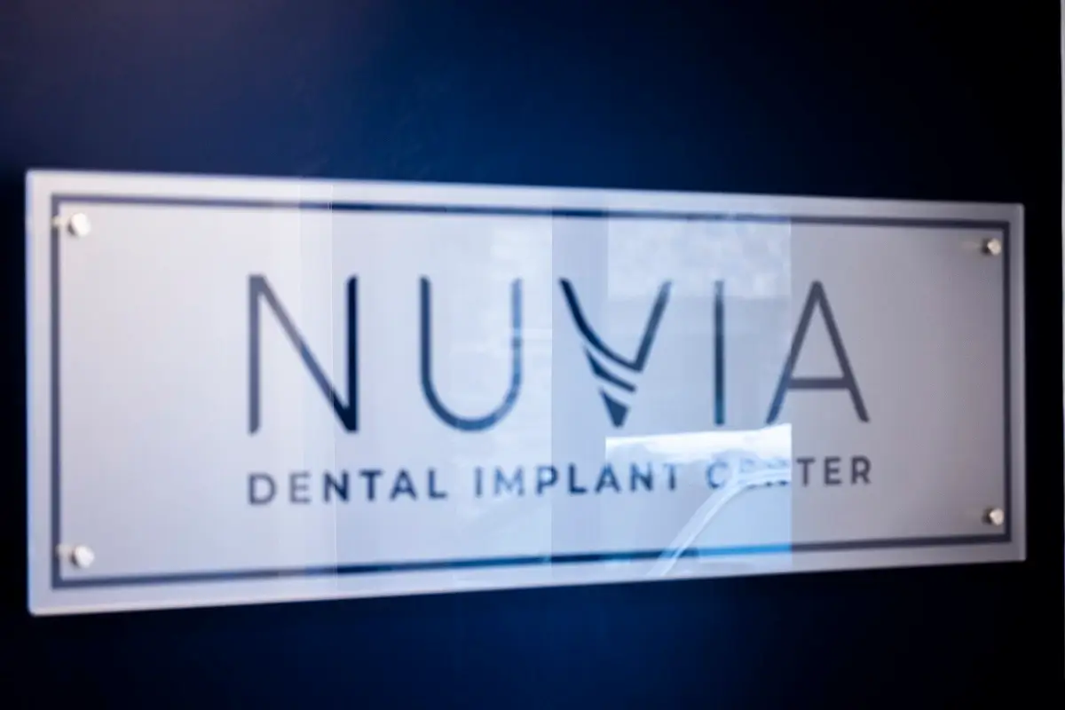 Nuvia Dental Implant Center Sign