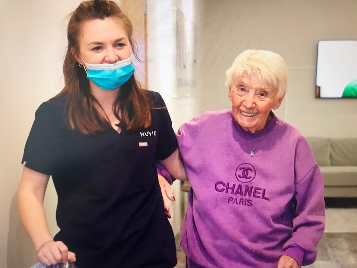 Dental Implant Patient with Nuvia Dental Implant Staff