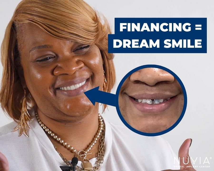 Woman with dream smile after dental implant financing