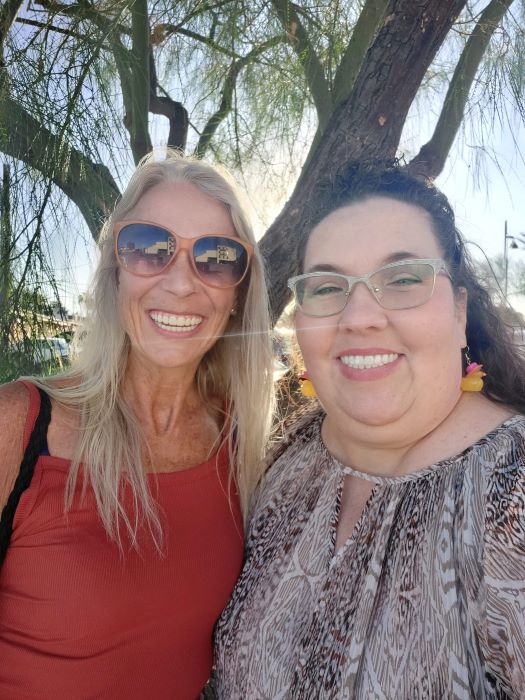 tricia and leslie smiling with permanent teeth in one day