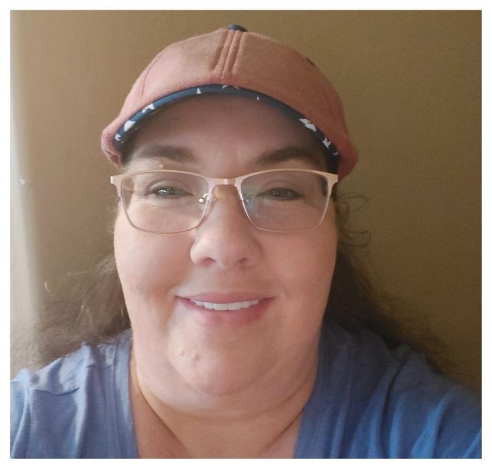 Tricia with her new permanent teeth in one day