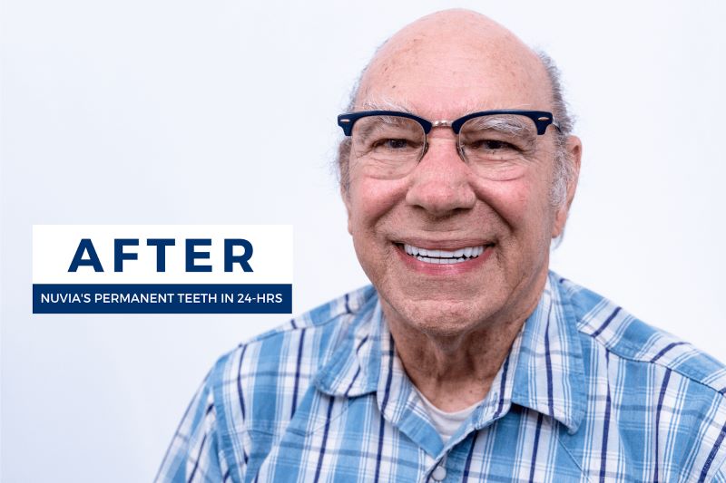 Patient smiling after getting dental implants