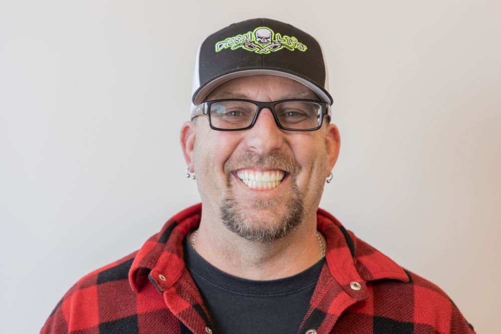 Paul smiling after getting his all-on-4 dental implants