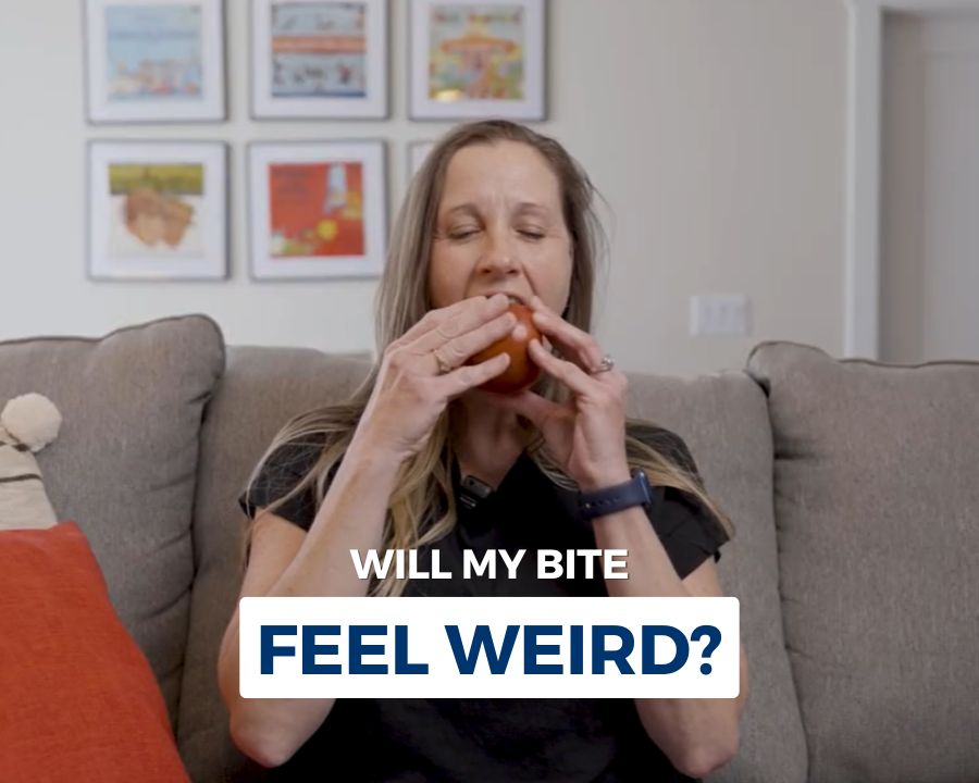 Woman biting apple with text that says "will my bite be weird"